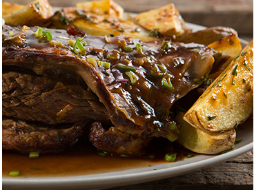 VACIO A LA MOSTAZA AL HORNO CON GUARNICION