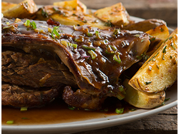 VACIO AL HORNO CON GUARNICION