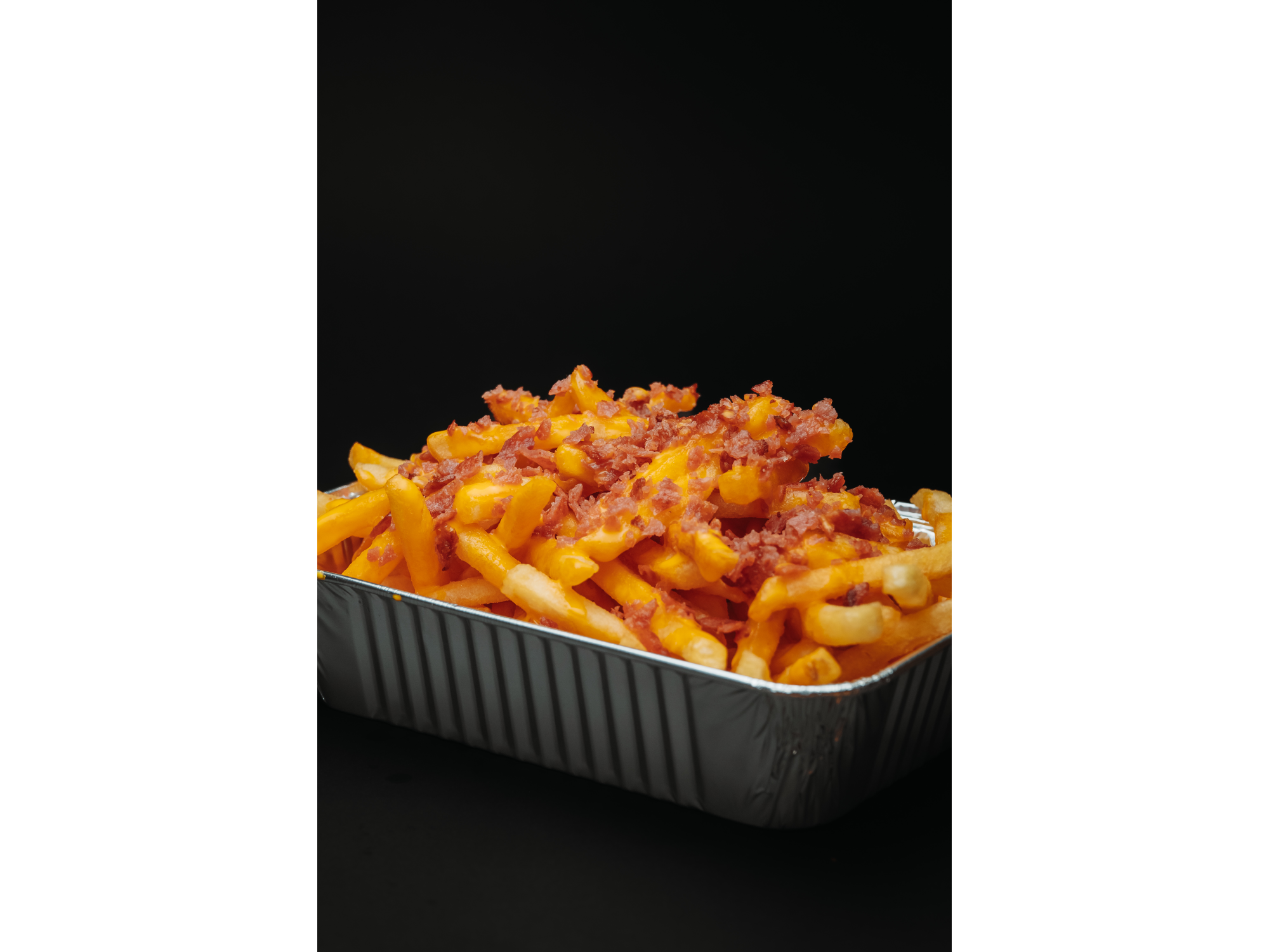 PAPAS CON CHEDDAR Y BACON