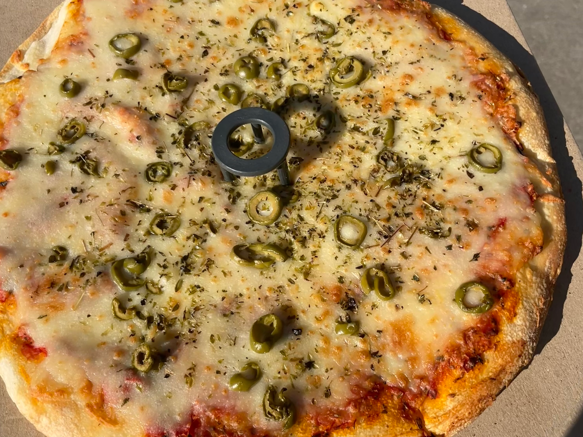 Pizza a elección + Muzzarella :