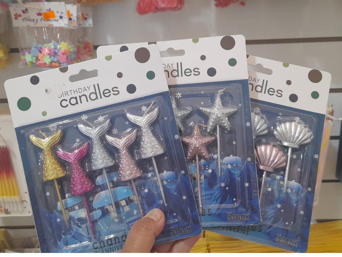 VELAS MOTIVO MARINA X 4 UNID.