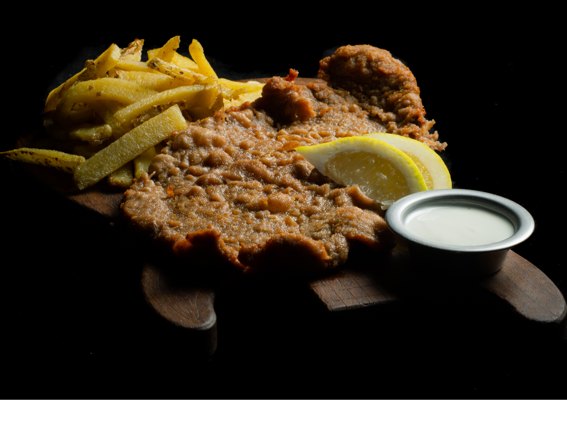 Tabla de milanesa de pollo de Rock And Rouge San Fco