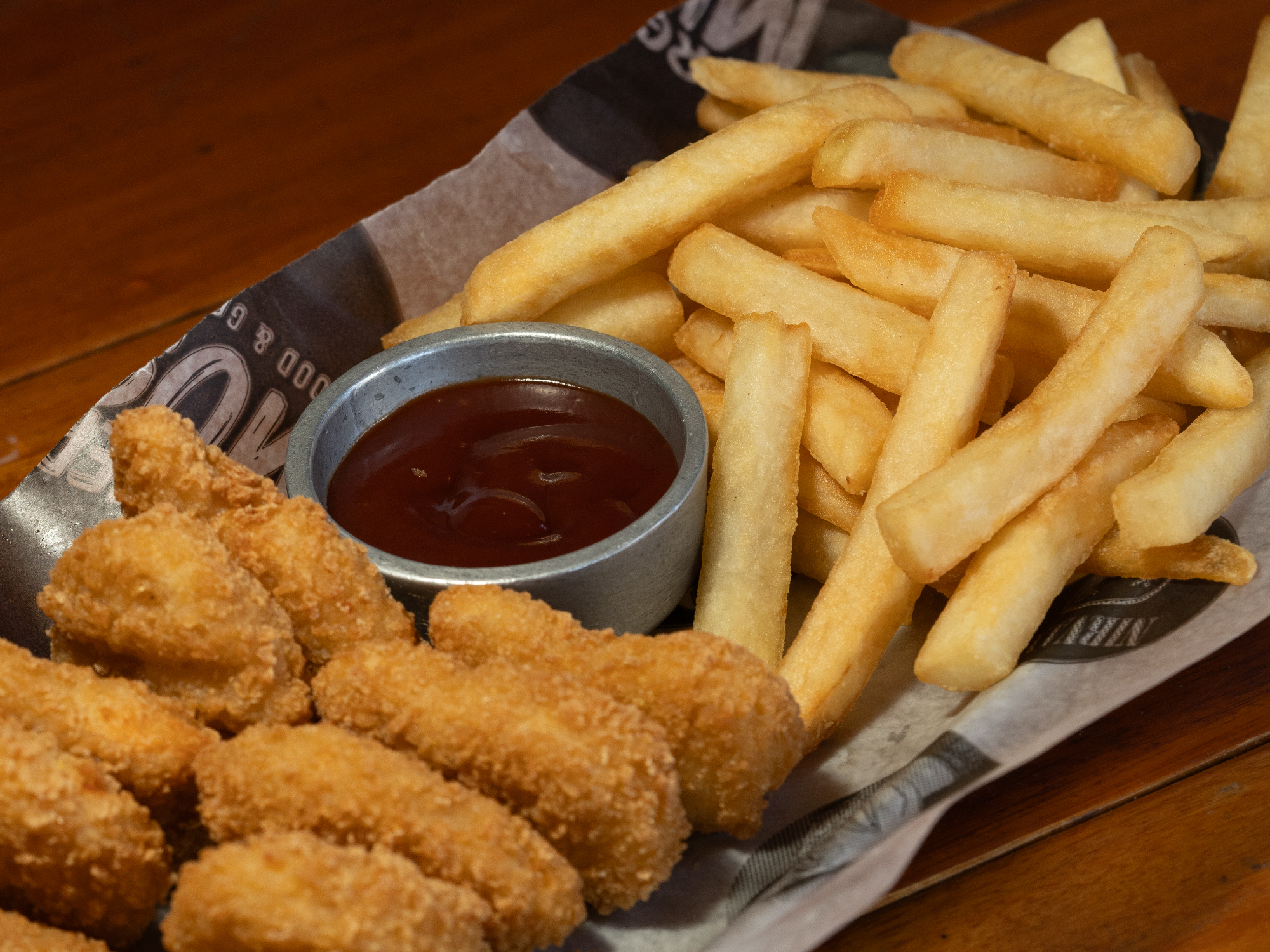 Nuggets de pollo + papas