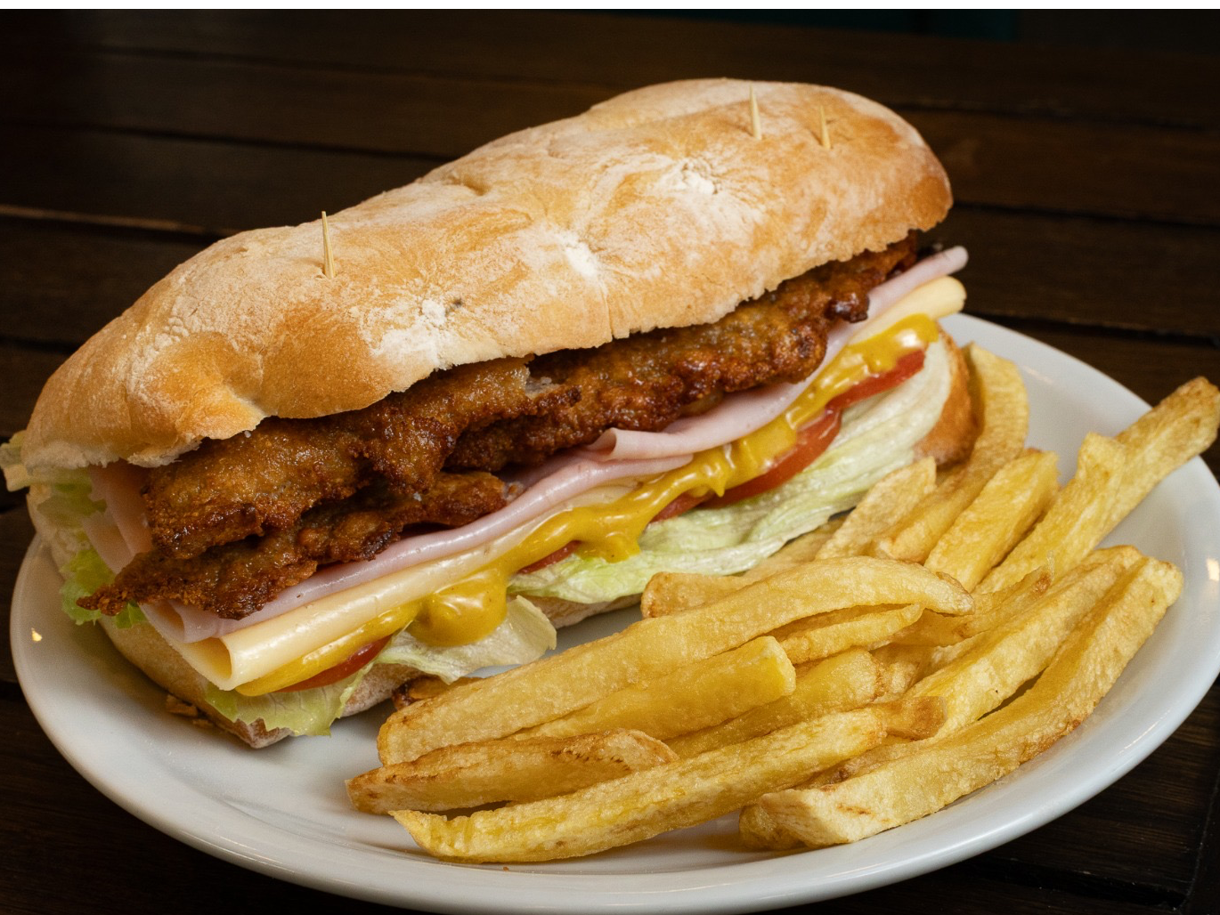 Milanesa de Estatus Pádel y Bar