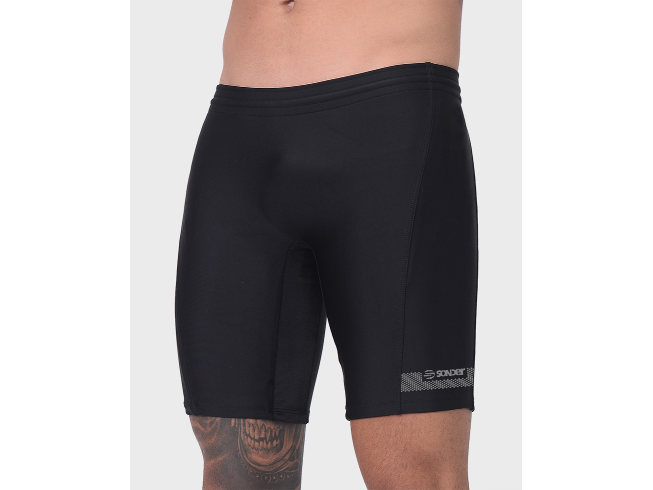 MALLA LARGA SLIP CON PIERNA LYCRA NEGRA