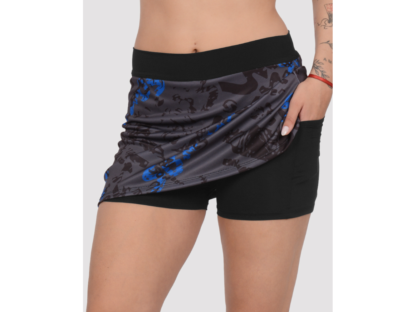 POLLERA POLIESTER ESTAMPADO CALZA Y BOLSILLO