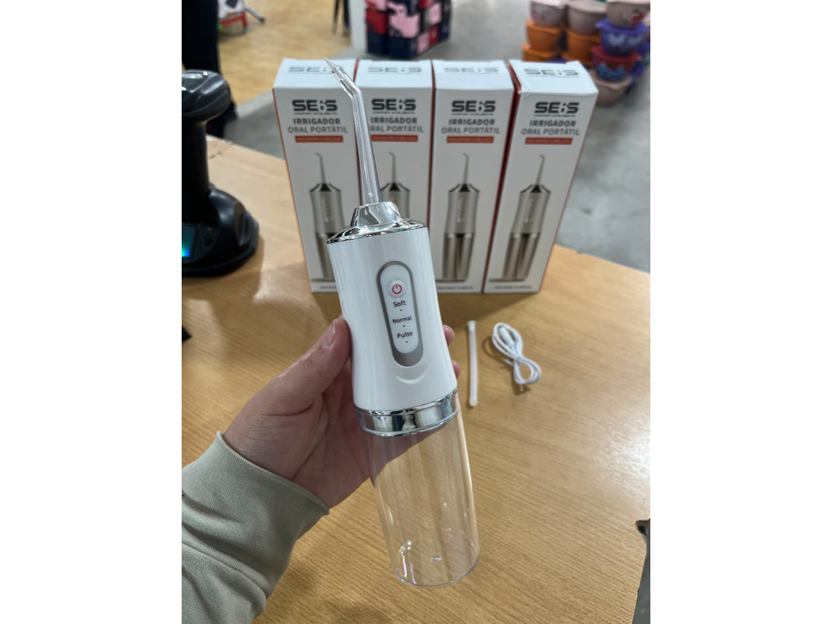 IRRIGADOR BUCAL PORTATIL