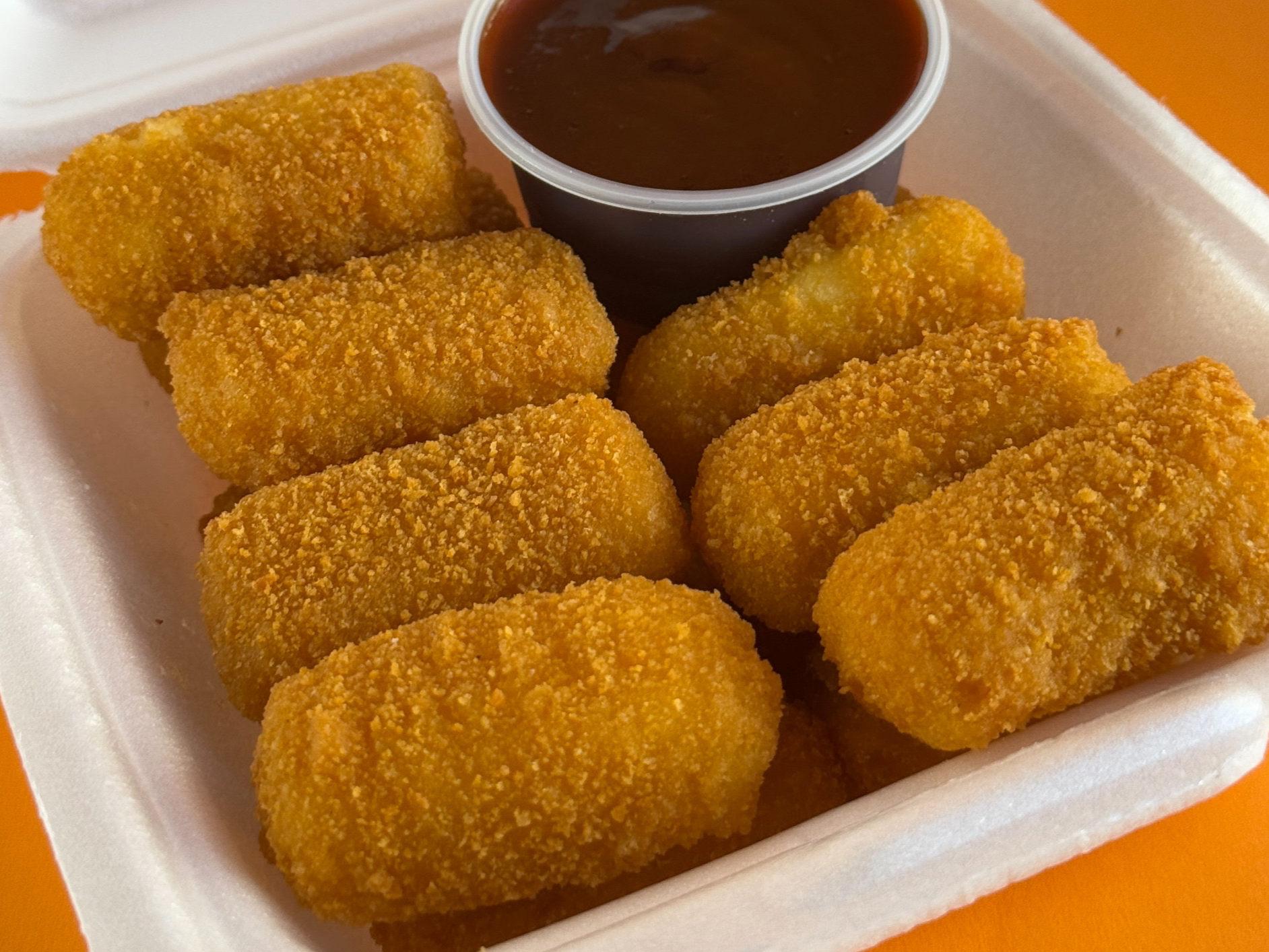 15 bastoncitos de muzarella con dip a eleccion