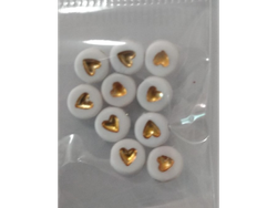 Corazón pasante blanco y dorado