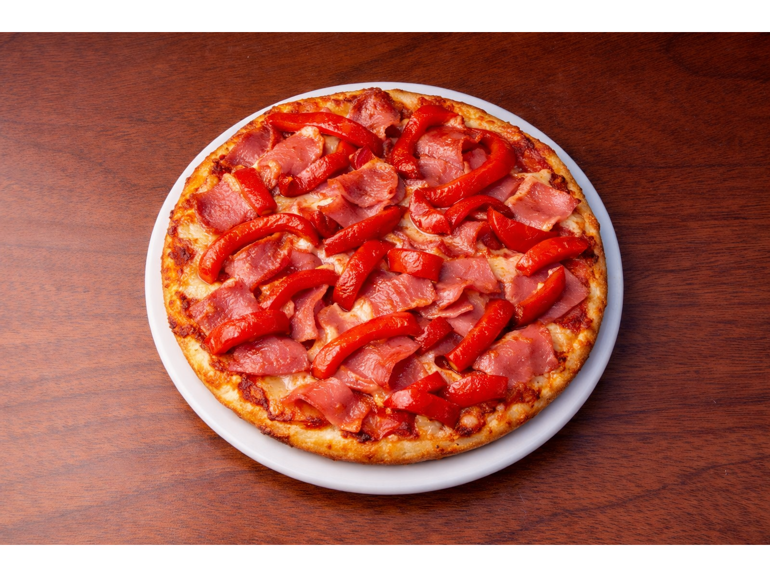 PIZZETA INTEGRAL JAMON Y MORRON XUND. LISTA PARA COMER