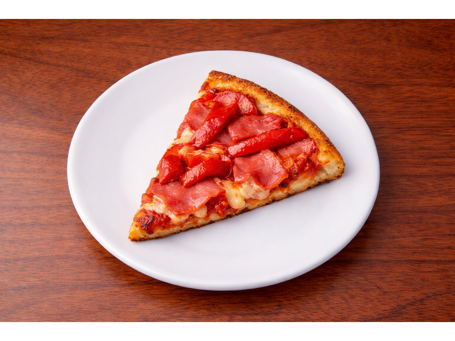 PIZZA INTEGRAL JAMON Y MORRON PORCION