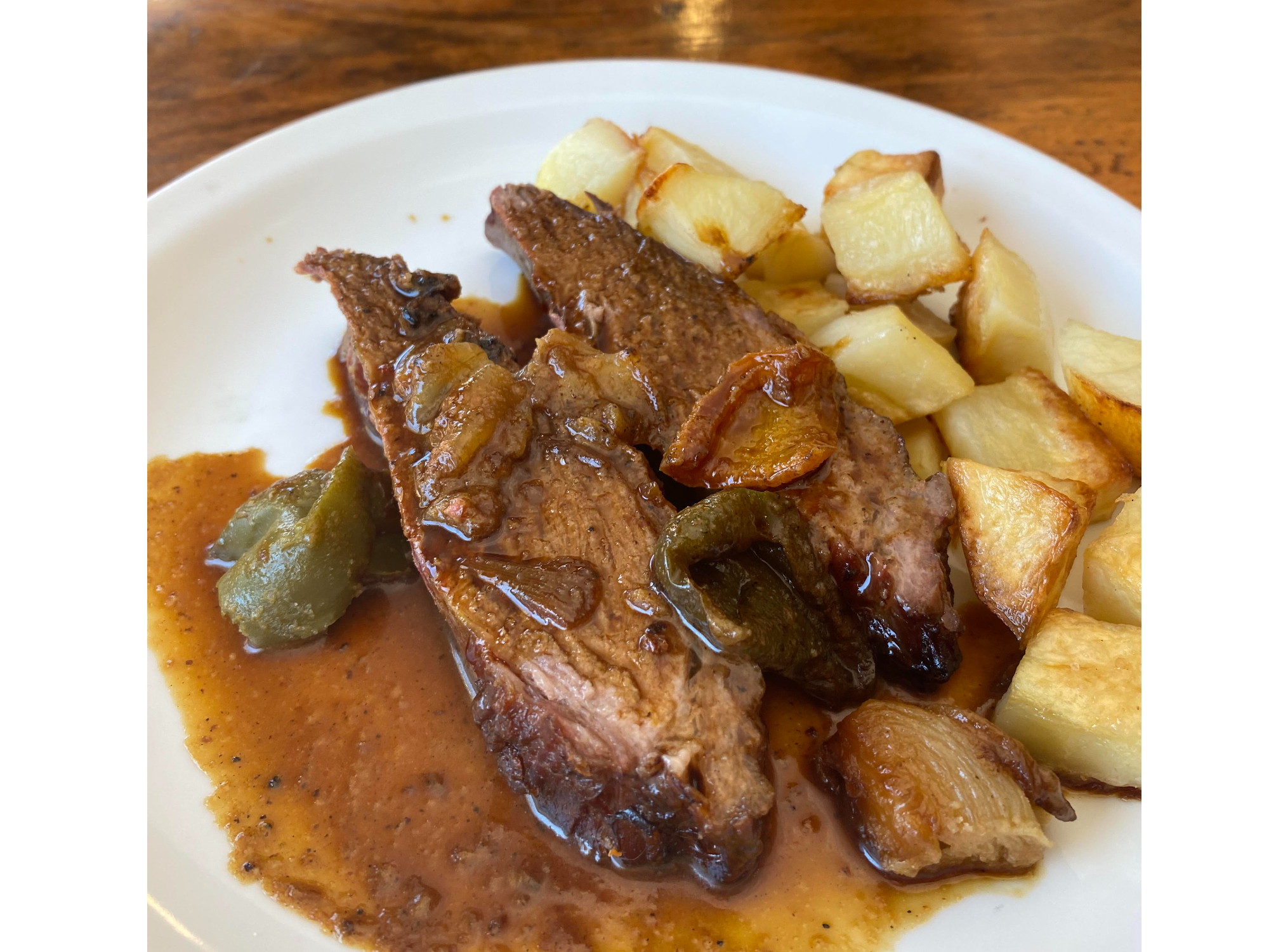 Carne al horno con papas porción