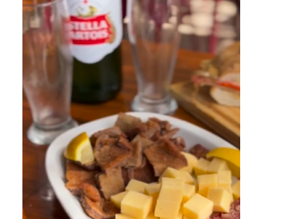 Picada de milanesa y queso