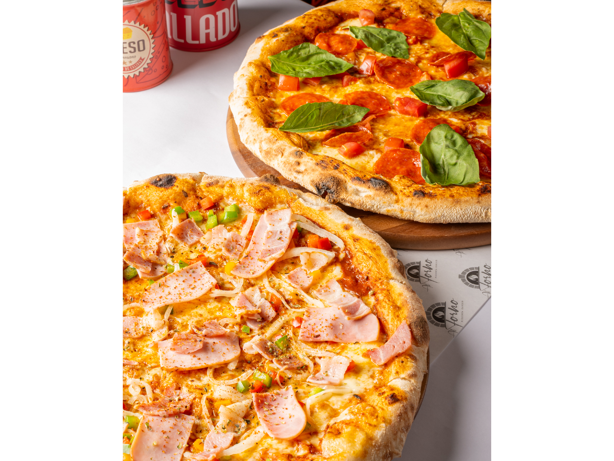 1 Pizza Familiar Clasica + 1 Pizza Familiar Gourmet