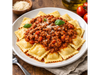 Ravioles con Salsa Bolognesa