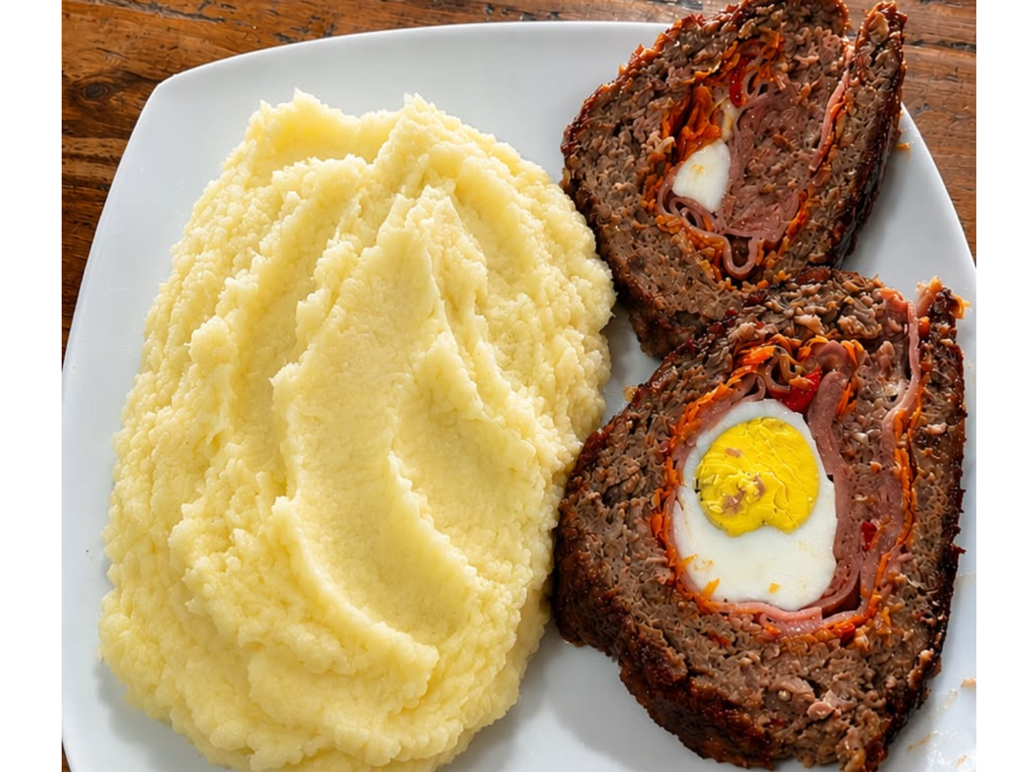 Arrollado de carne + guarnición