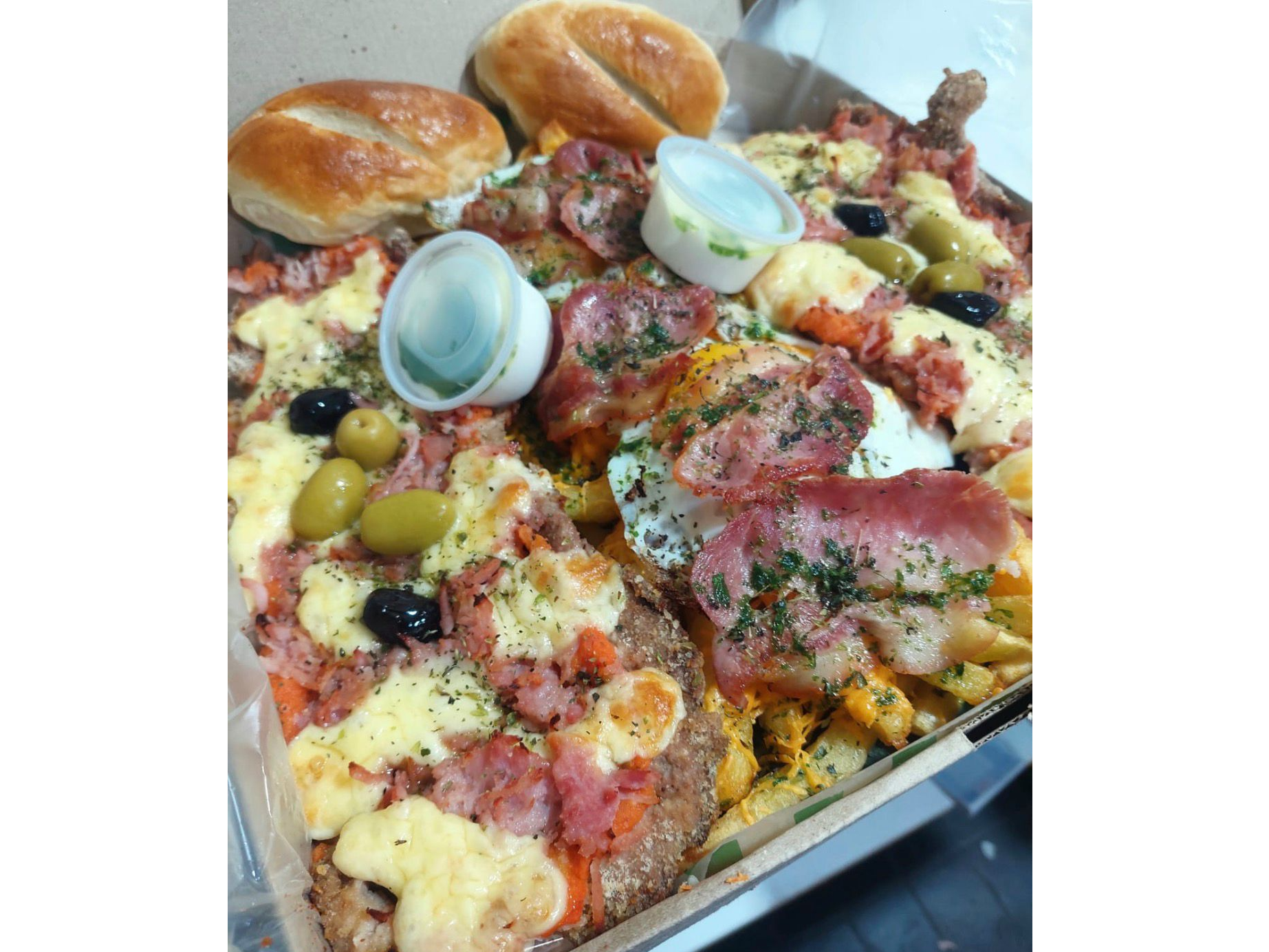 2 milanesas a la napolitana + adicional (4 personas)