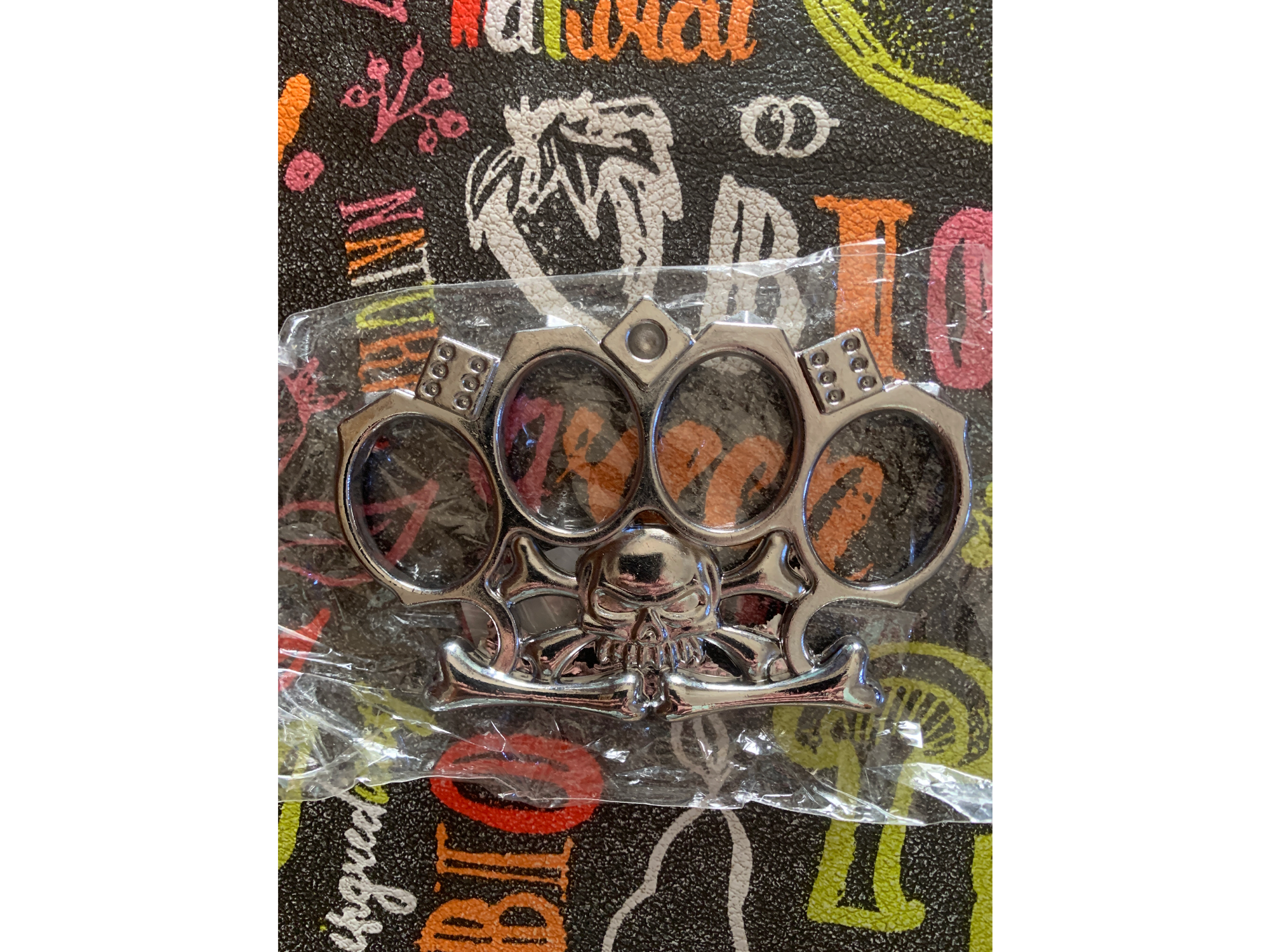 Manopla calavera plateada