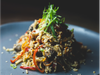 Wok de vegetales y arroz con lomo