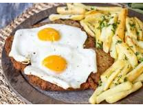 Milanesa a caballo con firtas o ensalada