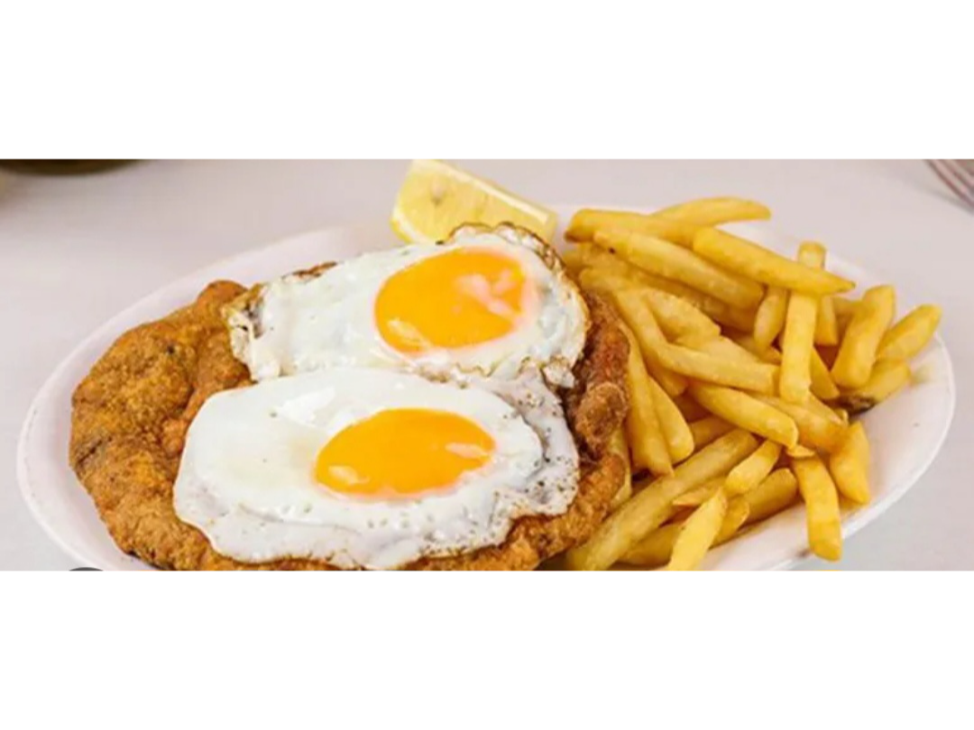 Milanesa a caballo con fritas