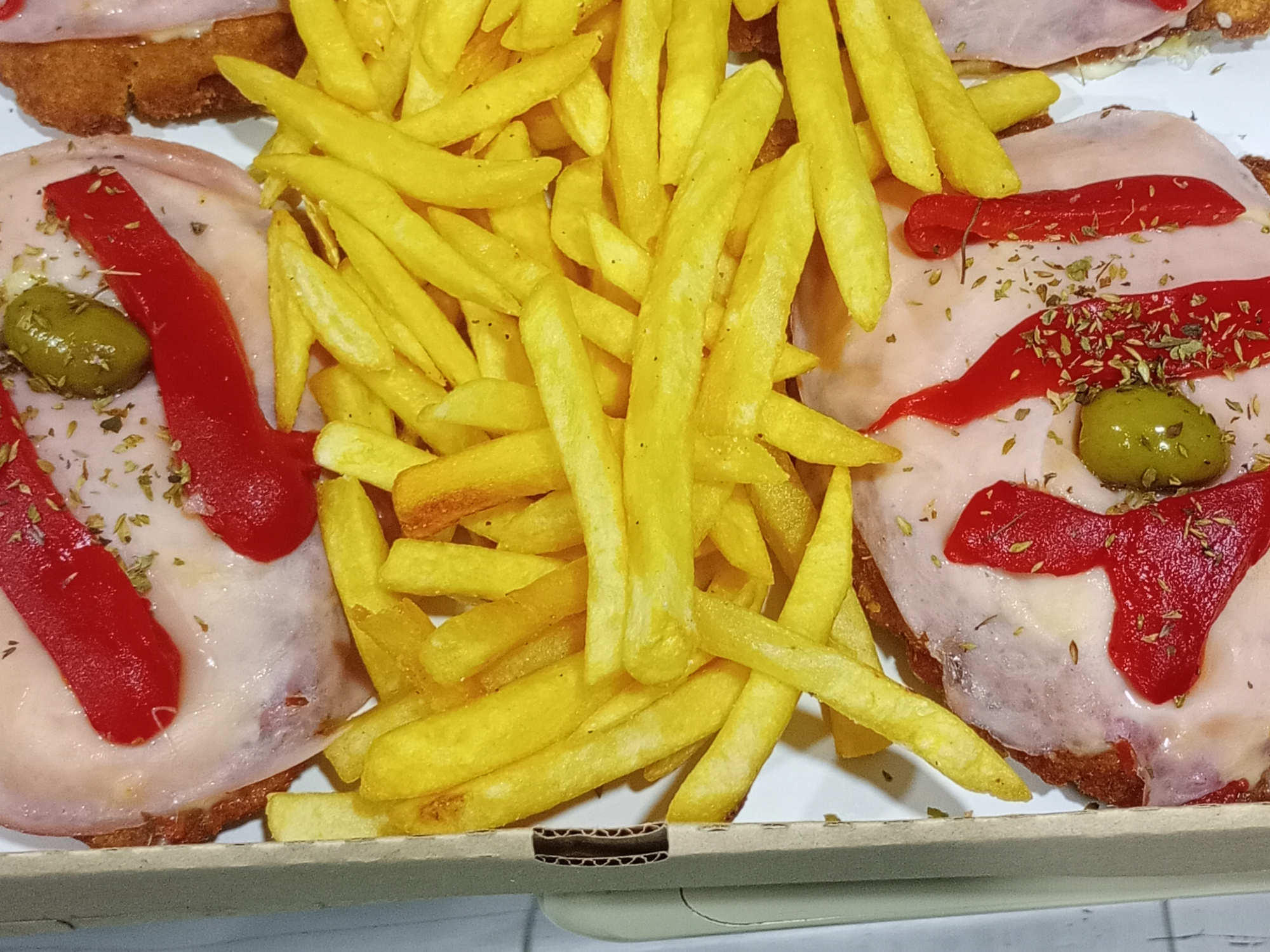 Milanesa con jamón y morrón