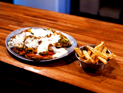 Milanesa o suprema mexicana con guarnición