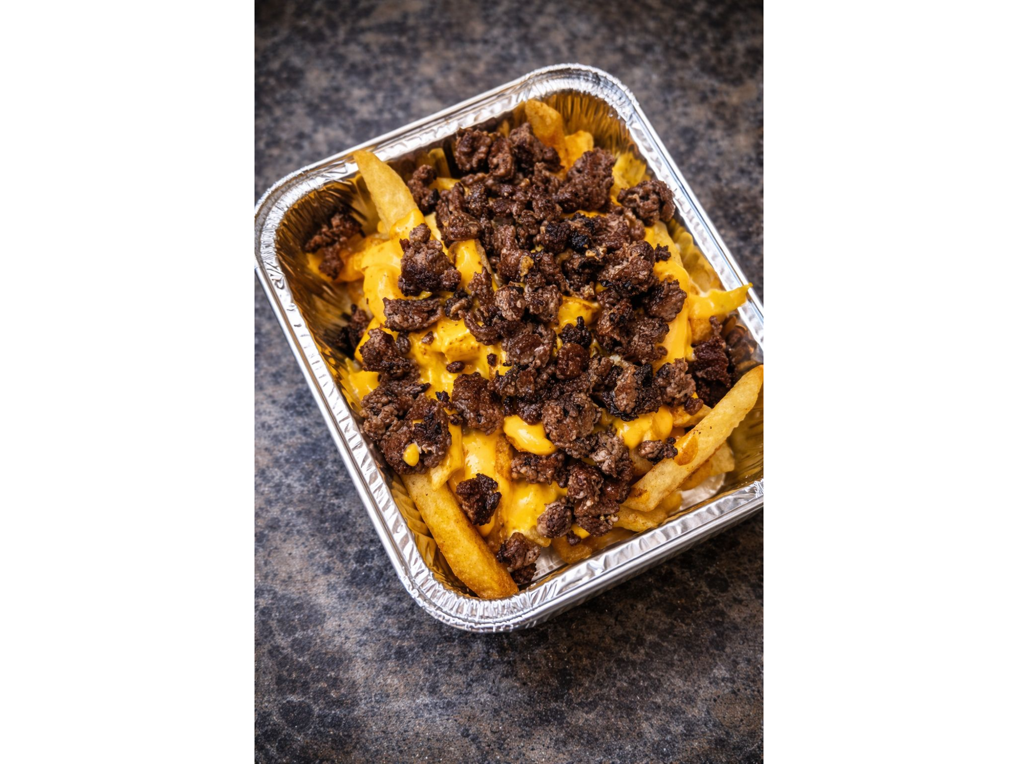 Papas con cheddar y smash bits