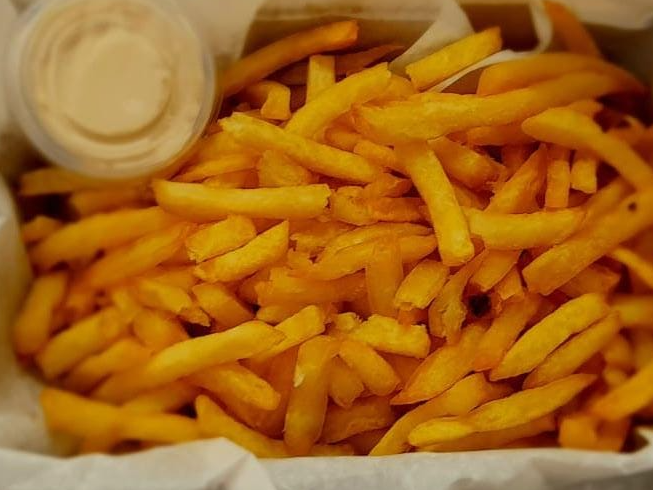 Porción de papas fritas CHICAS