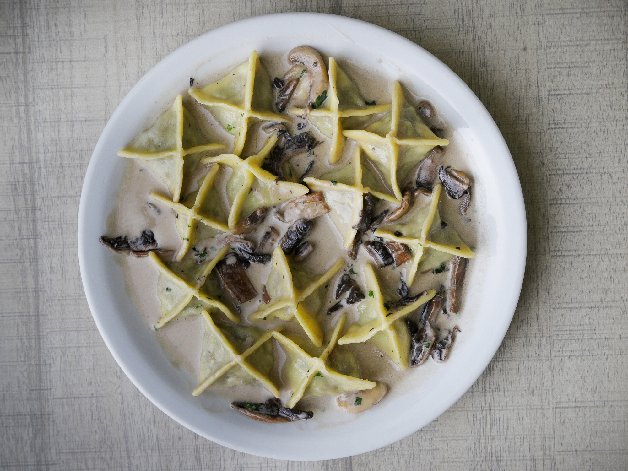 Fagottini de Pollo con salsa Champignon