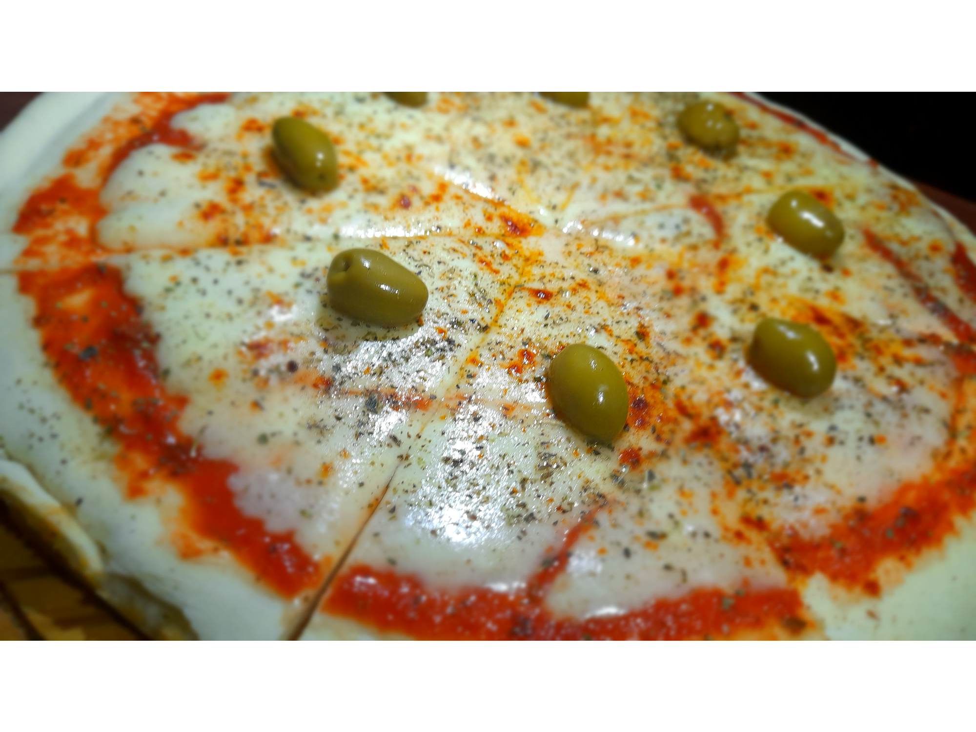 Pizza Muzzarella de Carnal - Tacos y Tragos