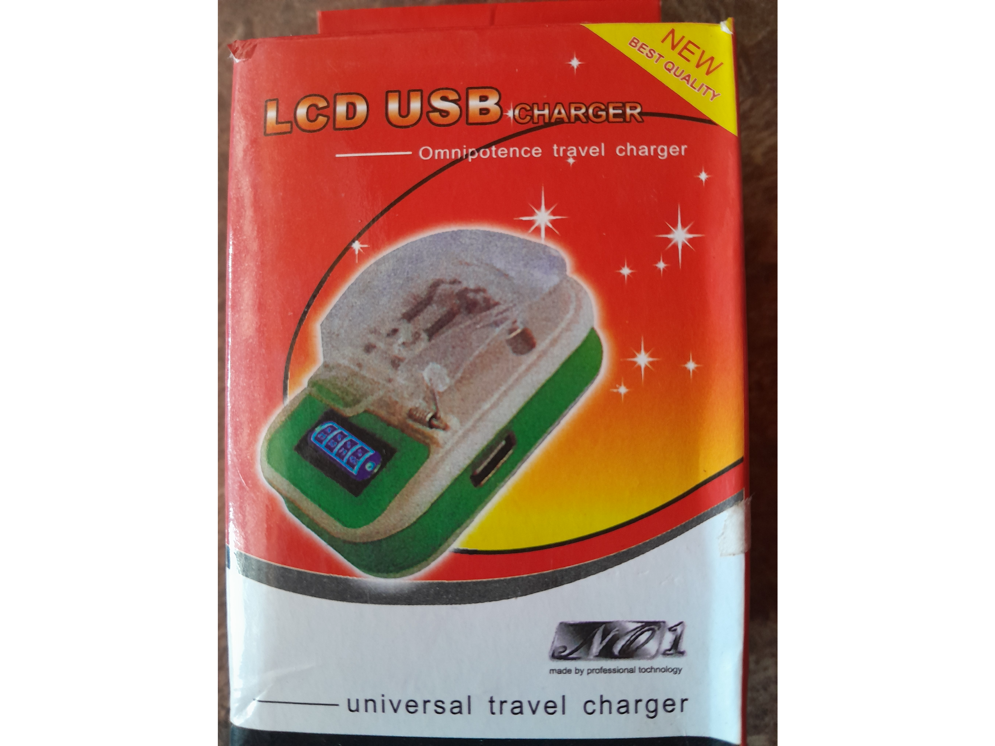 CARGADOR UNIVERSAL DE BATERIAS CON PANTALLA LCD Y SALIDA USB .