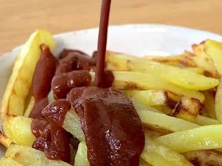 Papas fritas con Barbacoa de Que Lomitos Banda Norte