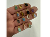 Gota facetada dorada