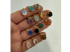 Oval facetado dorado
