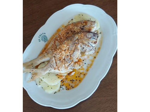 Merluza a la vasca con papas españolas