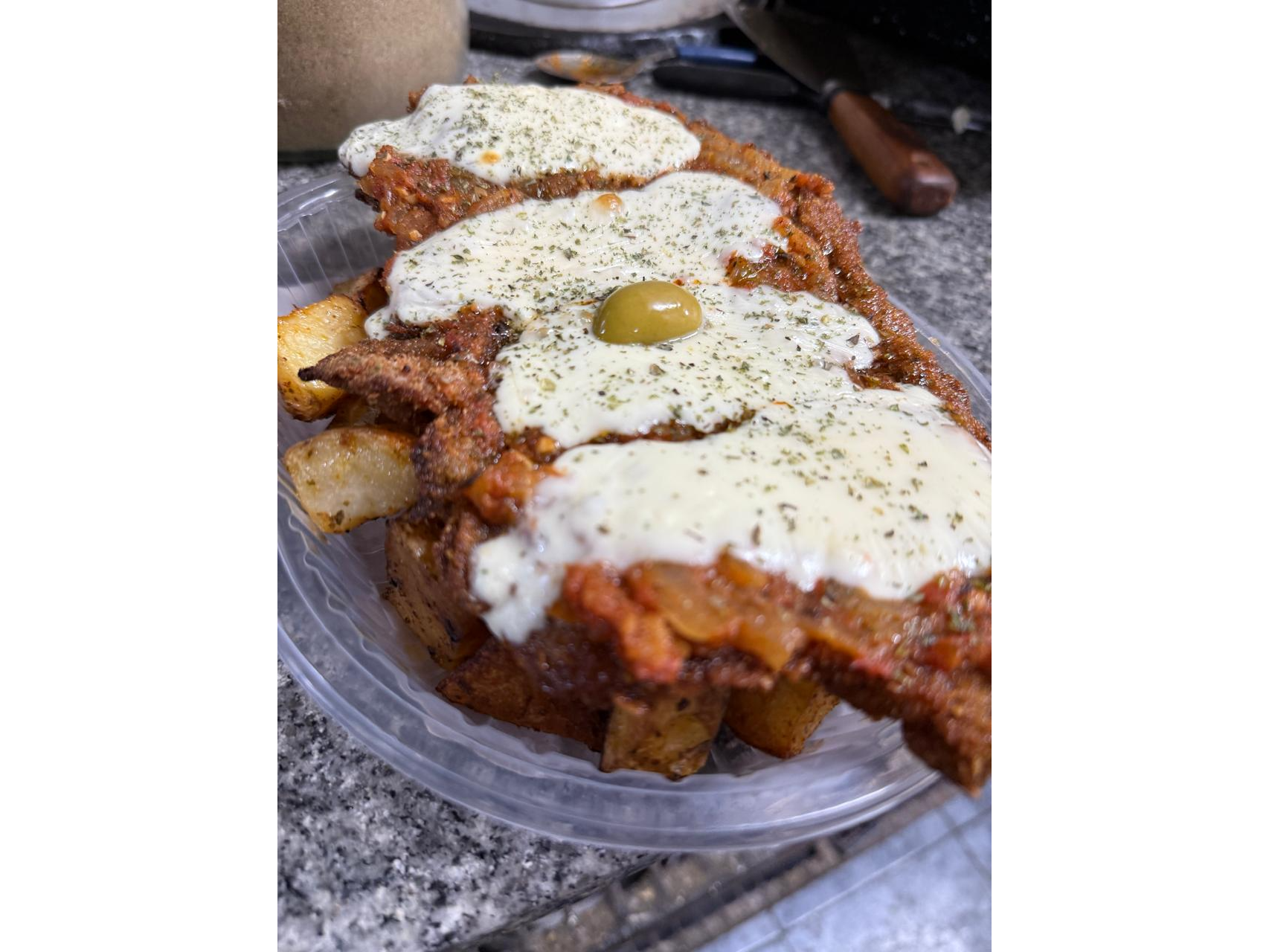 Milanesa a la napolitana con guarnición de El Calchaqui