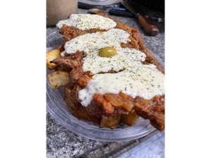 Milanesa a la napolitana con guarnición de El Calchaqui