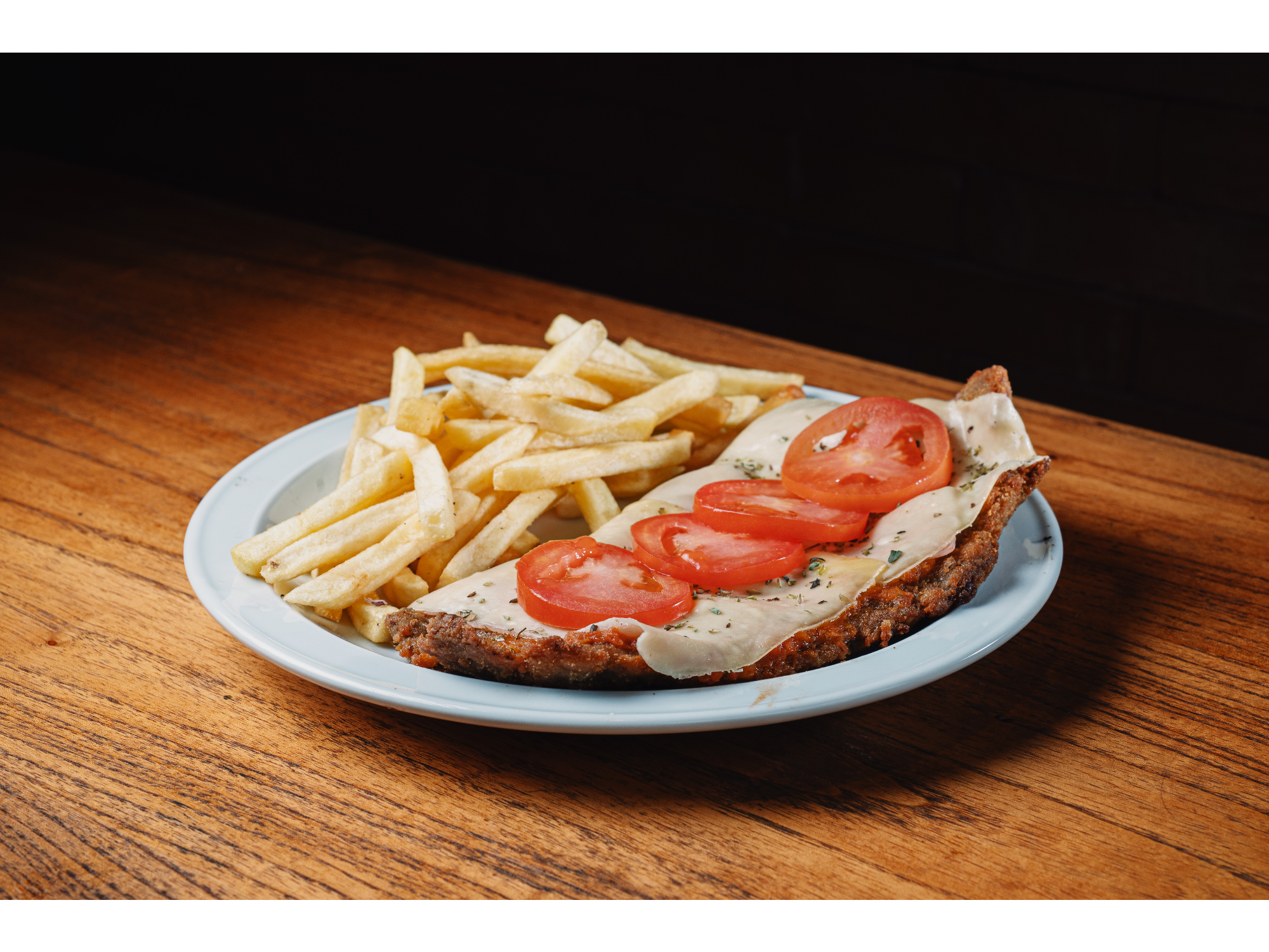 2 MILANESAS DE POLLO A LA NAPO + PAPAS