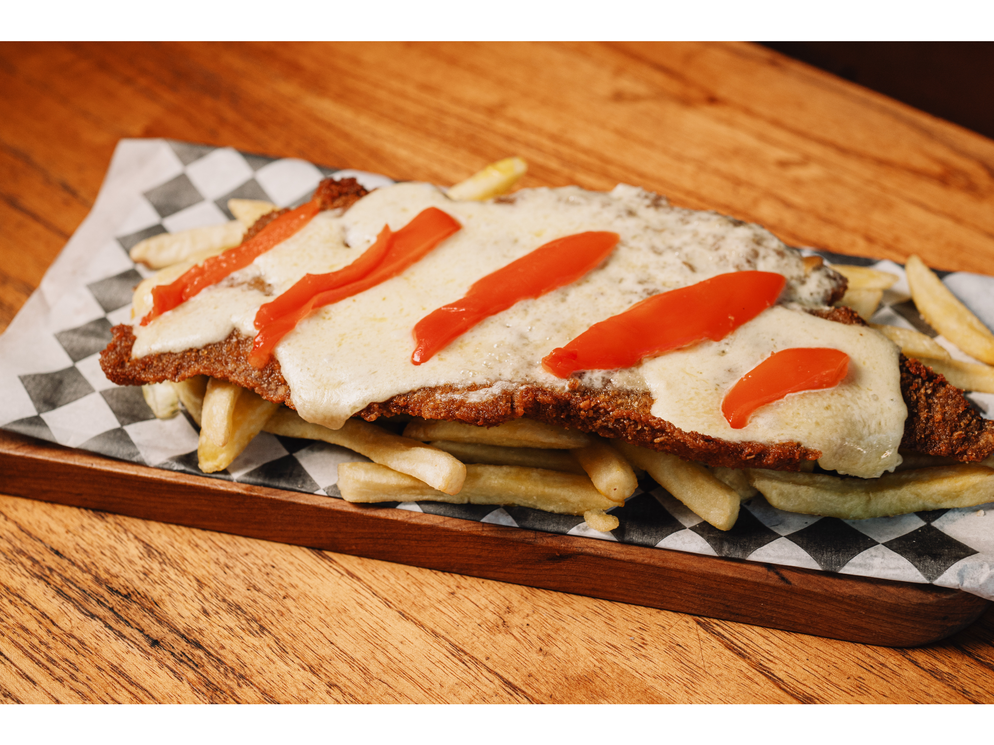 MILANESA A LA SUIZA CON GUARNICION