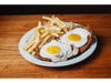 MILANESA A CABALLO CON GUARNICION