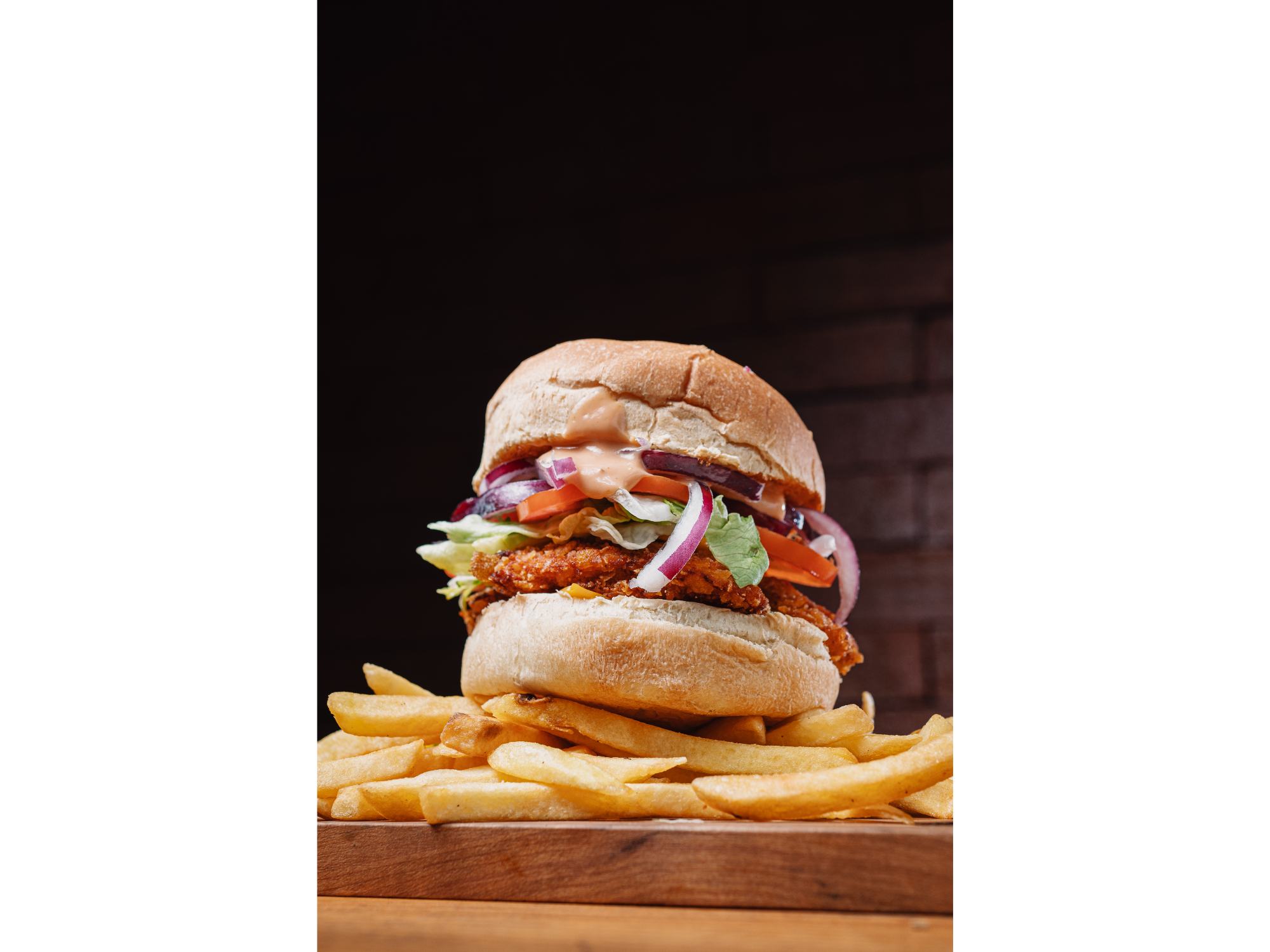 Burger American Pollo Crispy + Papas Fritas de TOPPING BURGER CERRO