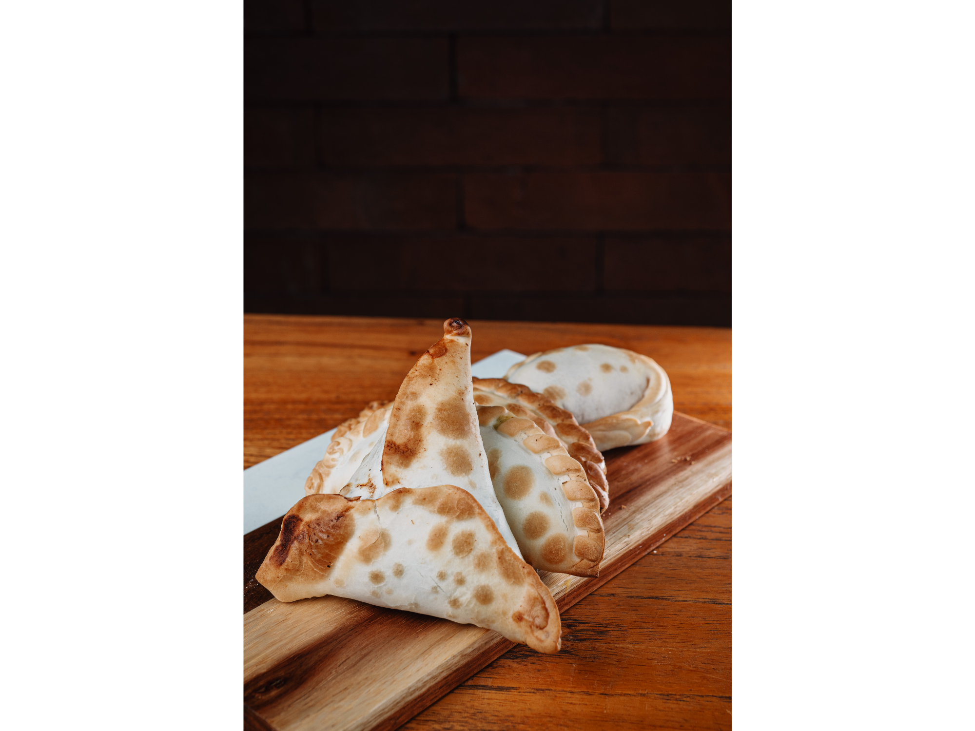 3 EMPANADAS + LATA O AGUA