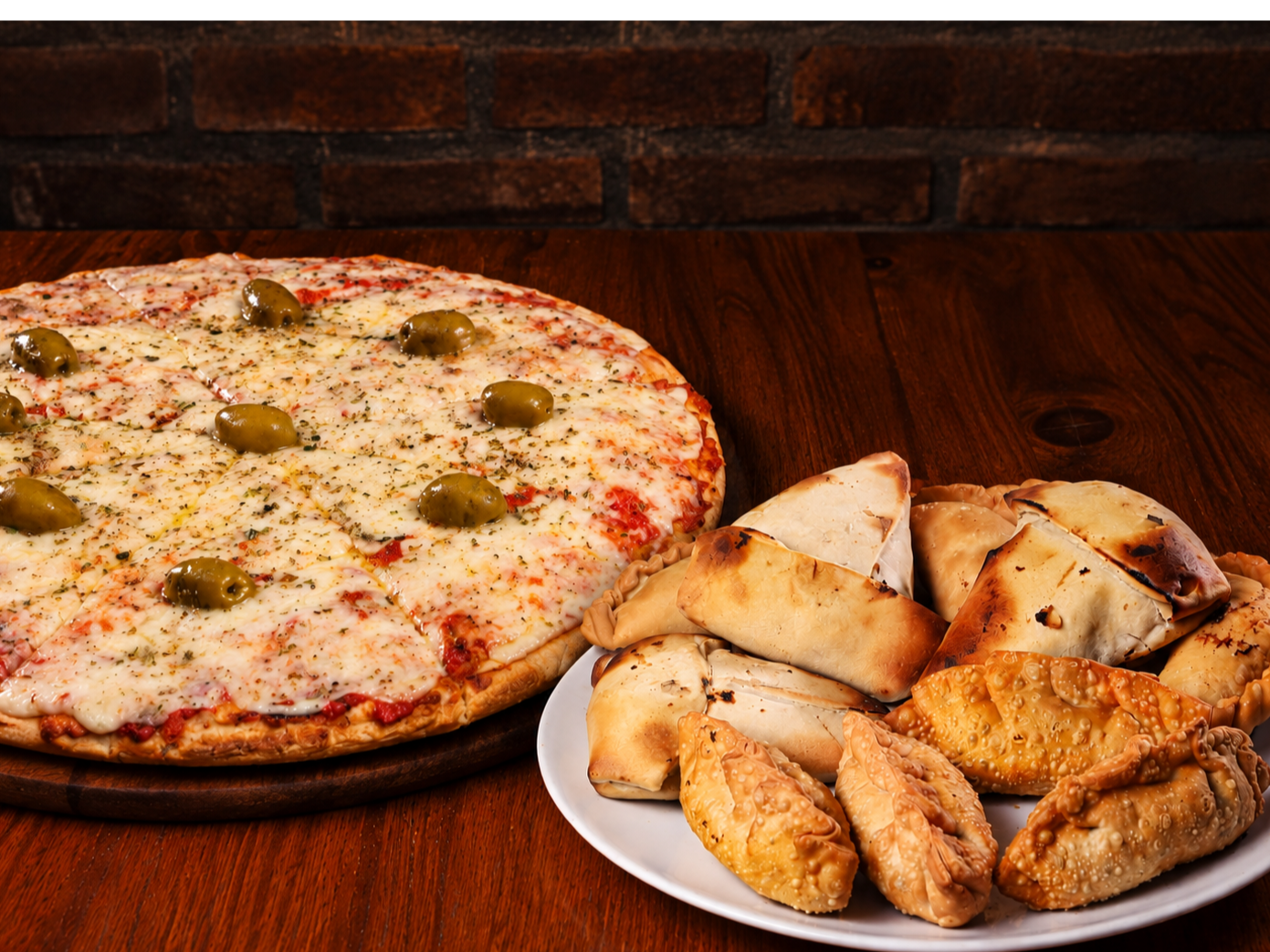 1 PIZZA MUZZARELLA+ 12 EMPANADAS A ELECCION