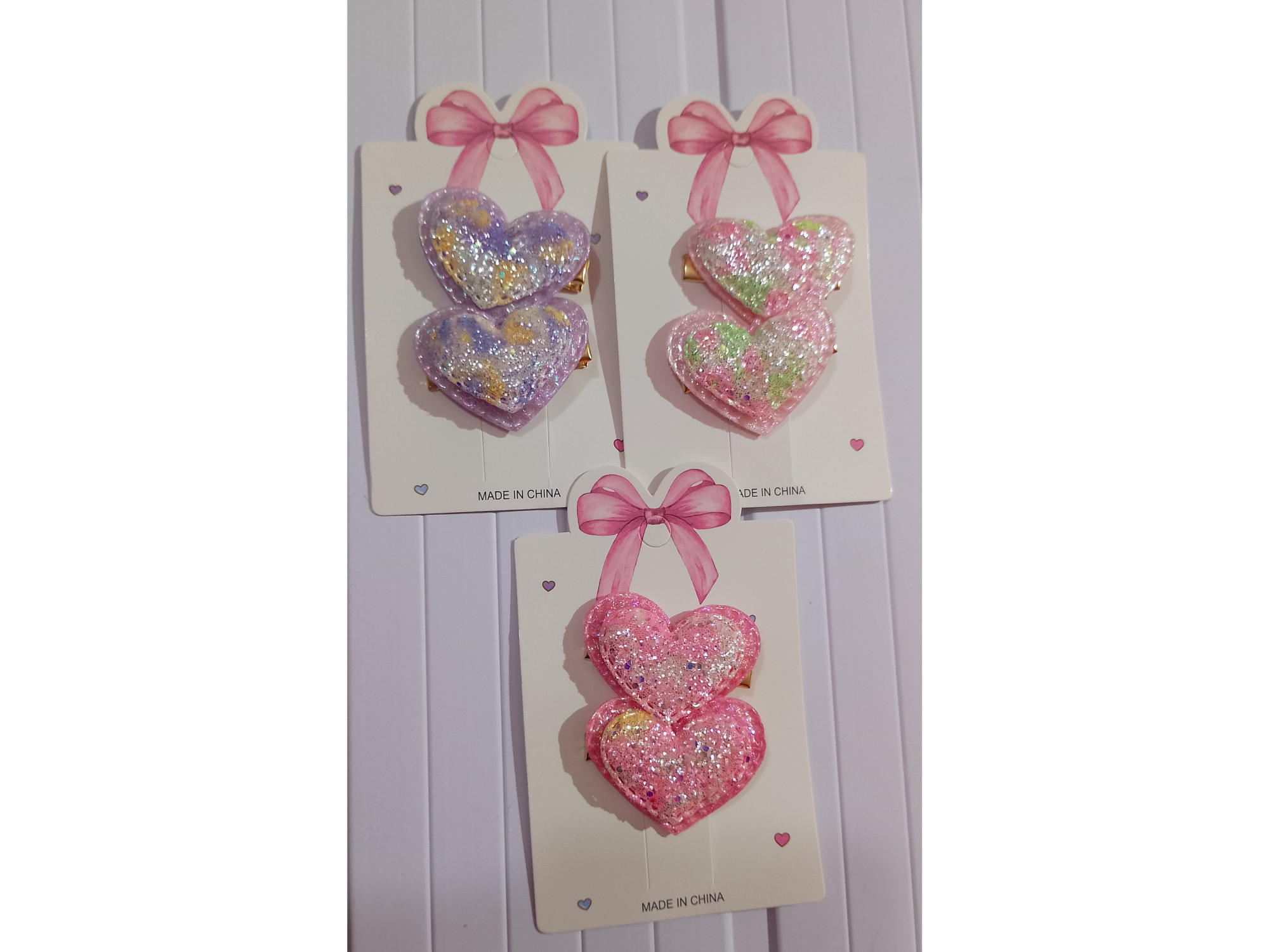 Hebillas corazón gliters x2 Cod.5