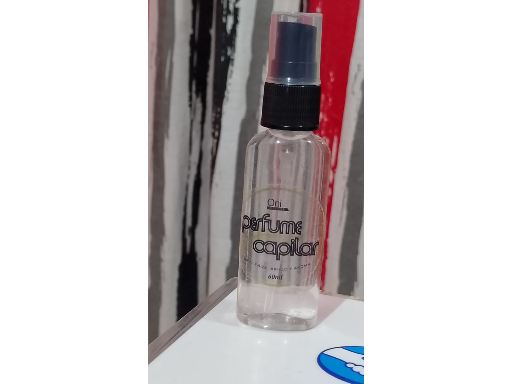 Perfume capilar ónix