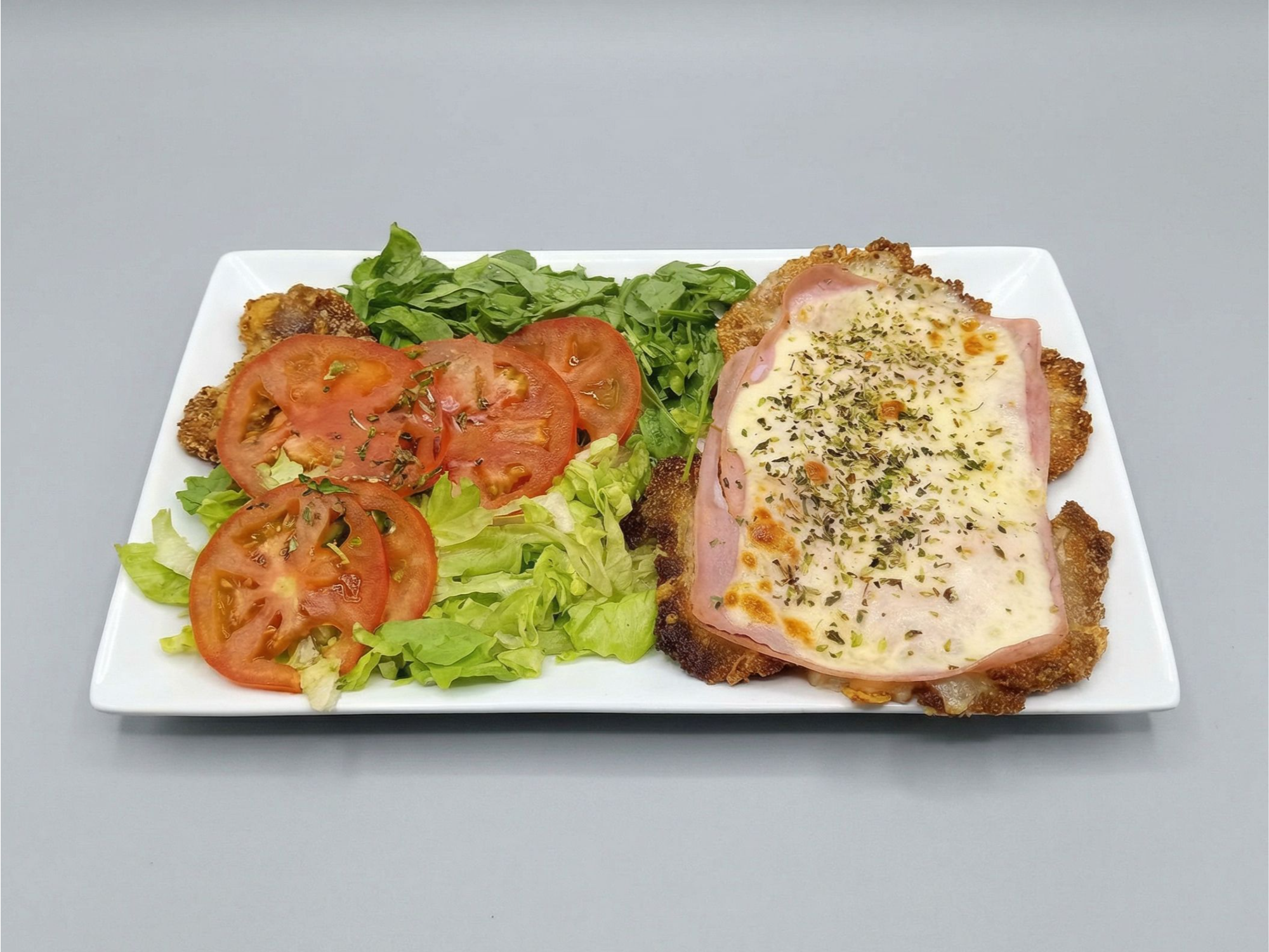Mila de pollo jamon/queso con ensalada