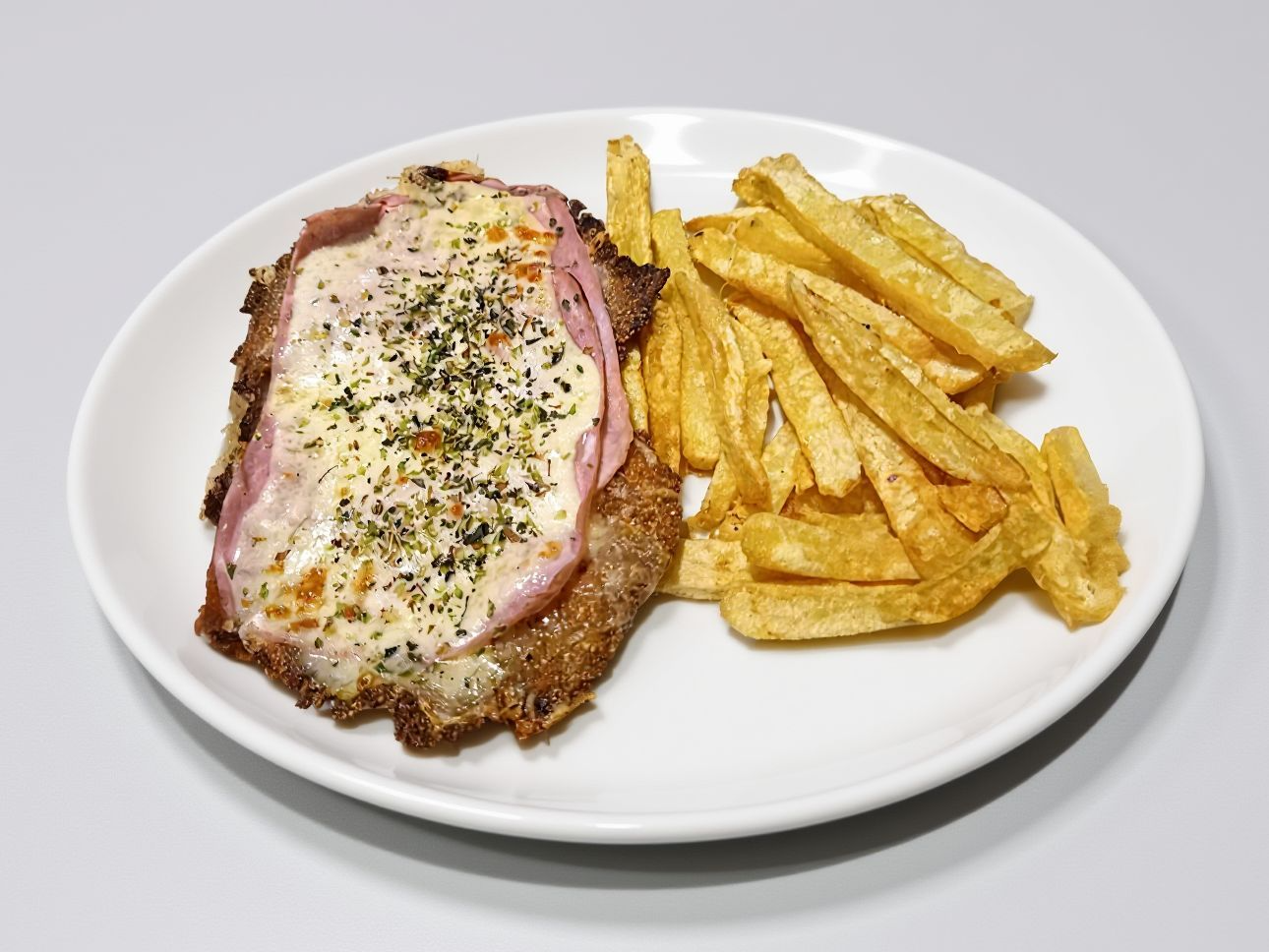 Mila de pollo jamon/queso con papas fritas