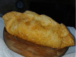Pollo cortado a cuchillo