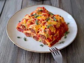 Canelones de verdura con salsa fileto